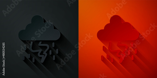 Paper cut Storm icon isolated on black and red background. Cloud and lightning sign. Weather icon of storm. Paper art style. Vector
