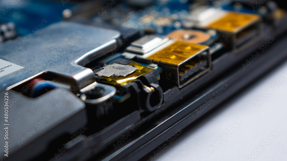 Headphone port in laptop motherboard ,focused view, white background Headphone port in laptop motherboard ,focused view, white background