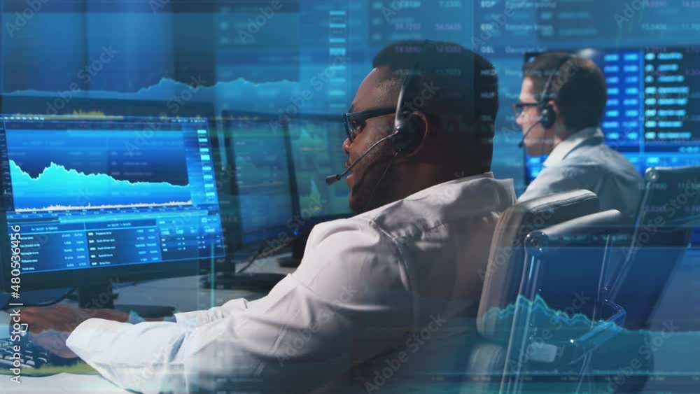 Office of international financial and trading company. Diverse team of traders and brokers is working using analysis technology. Global markets, business strategy, currency exchange and banking. Office of international financial and trading company. Diverse team of traders and brokers is working using analysis technology. Global markets, business strategy, currency exchange and banking.
