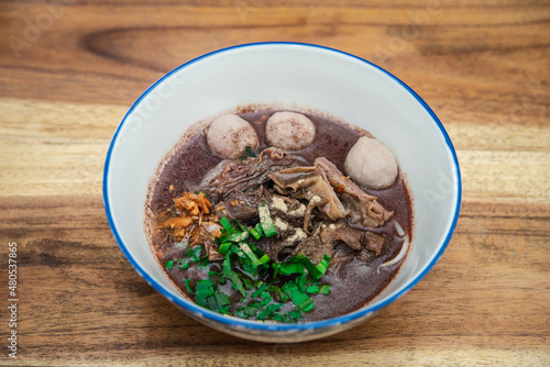 Braised beef clear noodle with meat ball soup stew photo