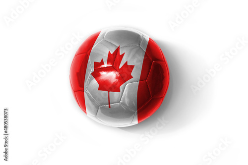 realistic football ball with colorfull national flag of canada on the white background. photo
