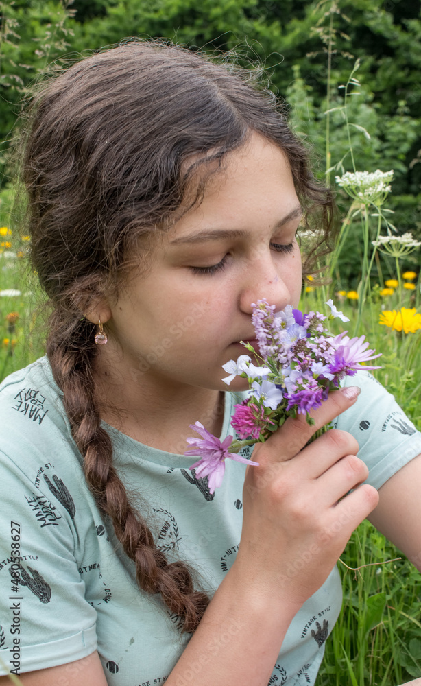 girl and a small bouquet of flowers.. girl and a small bouquet of flowers..