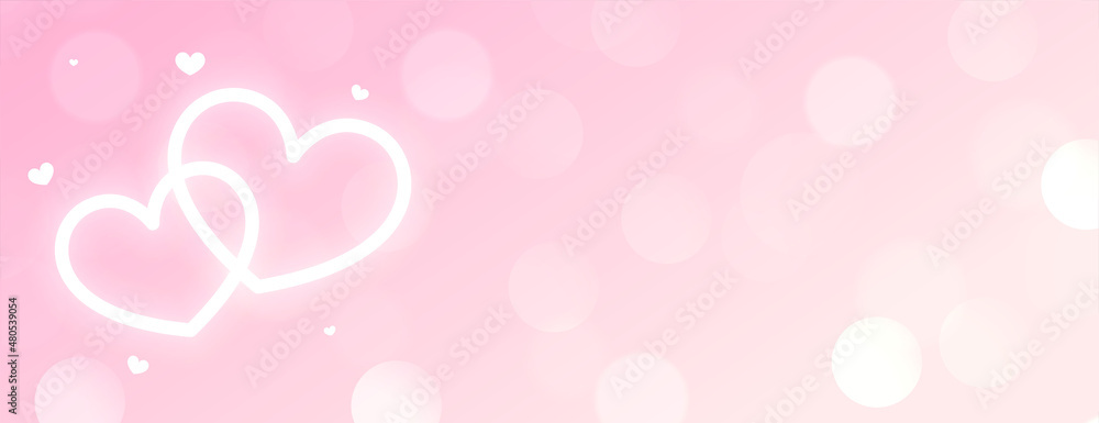 beautiful two neon glowing white hearts on pink bokeh background beautiful two neon glowing white hearts on pink bokeh background