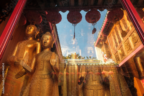 Photography Bangkok, Thailand - January 2022: Buddha statues in the Buddhist temple Wat Mangkon Kamalawat on January 7, 2022 in Bangkok, Thailand
