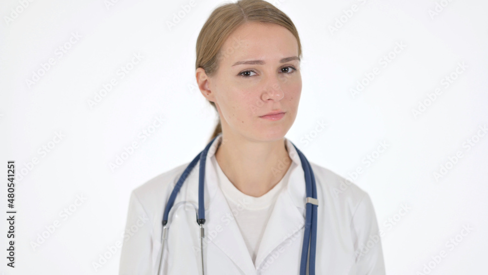 Female Doctor showing No Sign by Shaking Head on White Background Female Doctor showing No Sign by Shaking Head on White Background