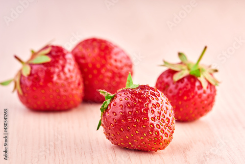 strawberries on a wooden background