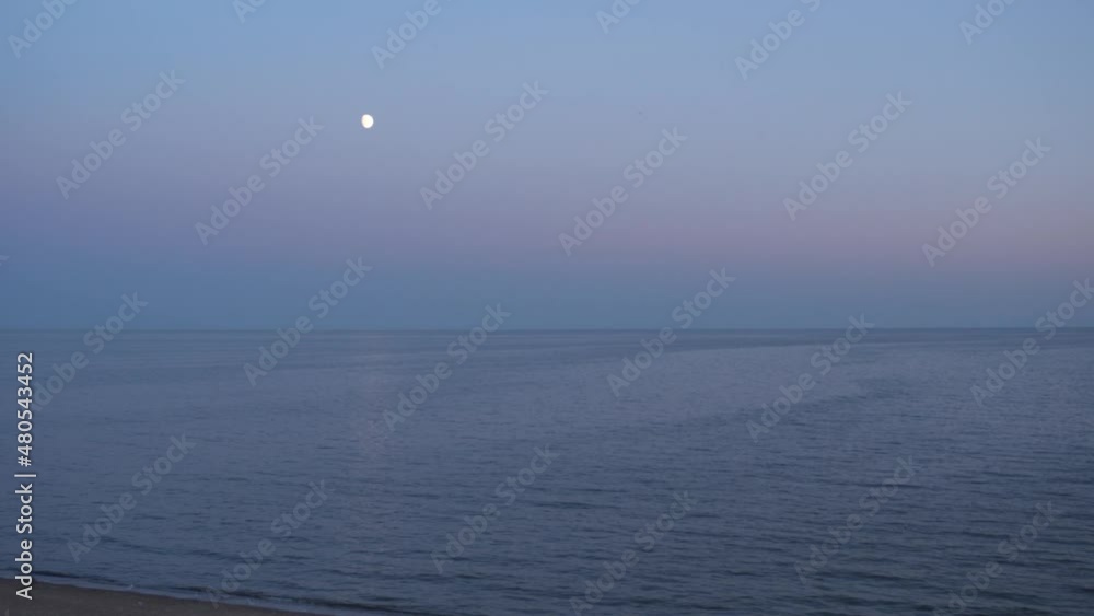 Beautiful shiny moon path on the surface of the sea.