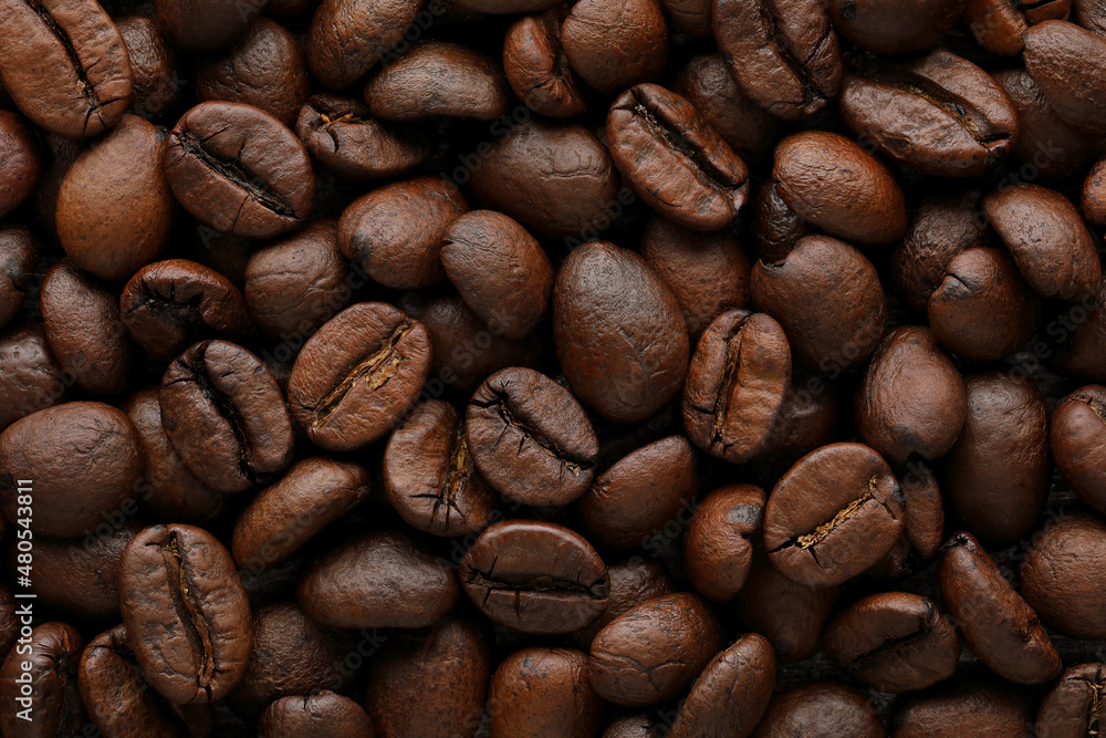 Coffee beans background. Background of roasted coffee beans Coffee beans background. Background of roasted coffee beans