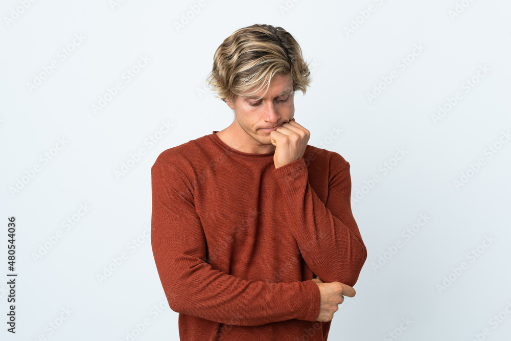 English man over isolated white background having doubts English man over isolated white background having doubts