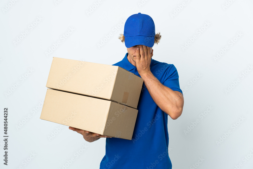 Delivery man over isolated white background with tired and sick expression Delivery man over isolated white background with tired and sick expression