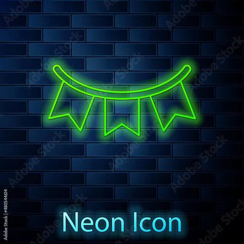 Glowing neon line Carnival garland with flags icon isolated on brick wall background. Party pennants for birthday celebration, festival decoration. Vector
