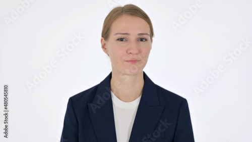 Young Businesswoman showing No Sign by Shaking Head on White Background