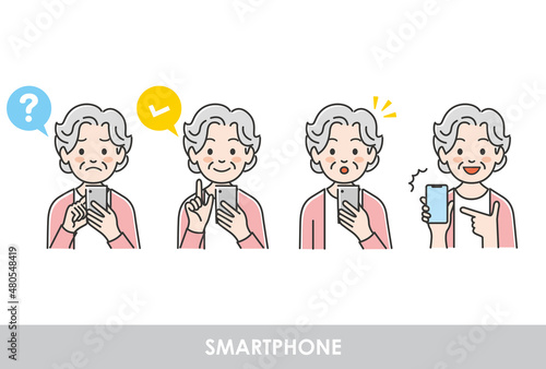 スマートフォンを操作している高齢女性