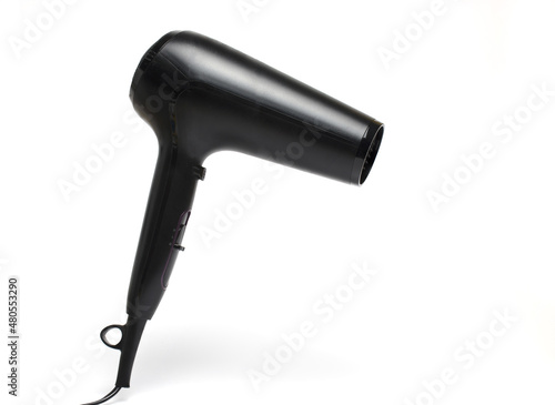 Closeup modern black hair dryer white background photo