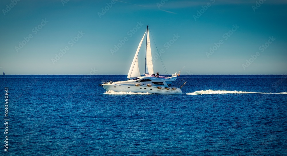 yacht and sailing ship at the sea