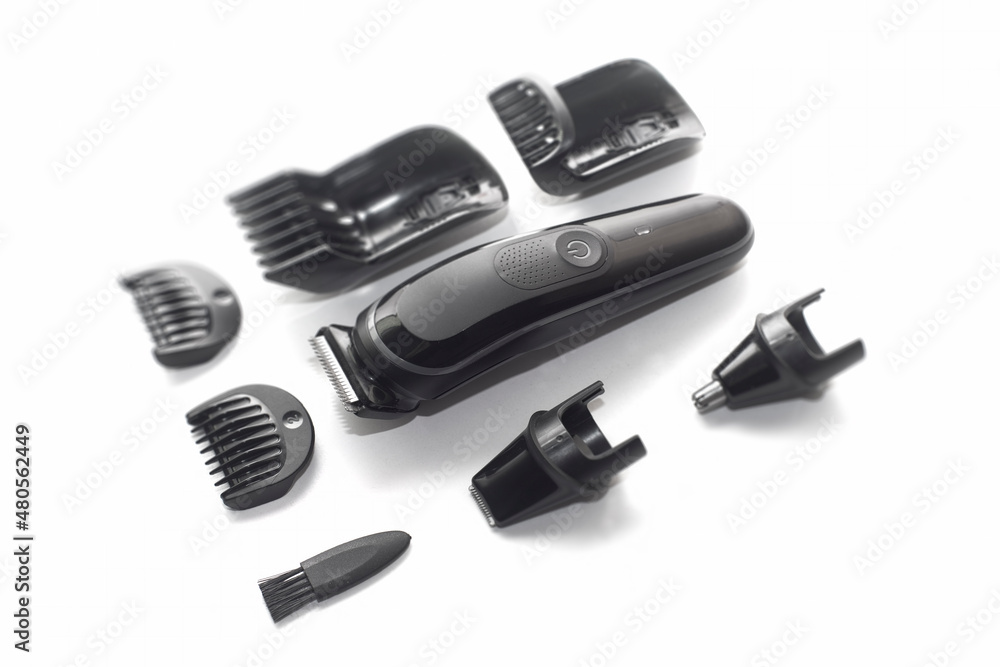 A set of the cordless electric hair clipper isolated on the white background	