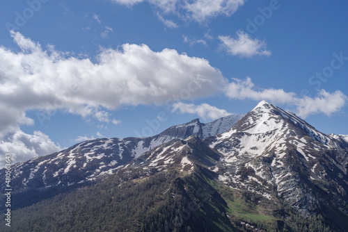 Cottian Alps mountain range view above from Stura di Demonte Valley, Province of Cuneo, Italy