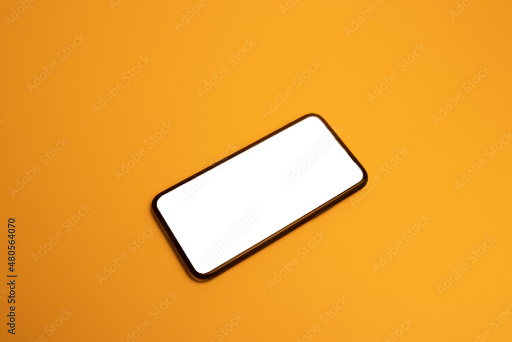 Smartphone mockup in rotated position on yellow background. Smartphone mockup in rotated position on yellow background.