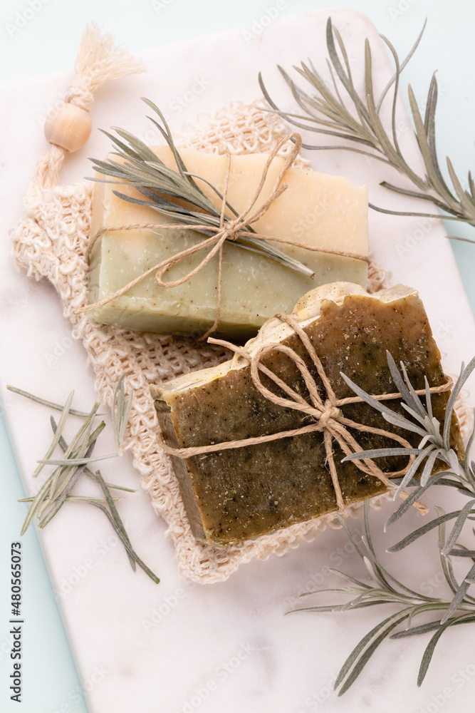 Obraz premium Handmade natural soap on pastel background.