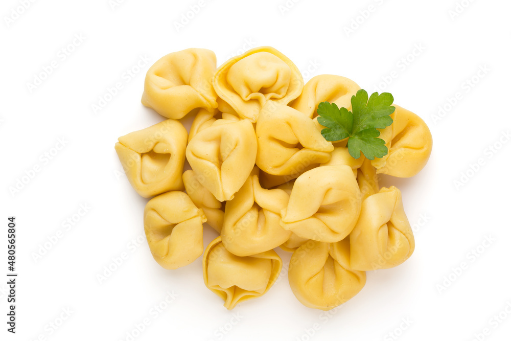 Raw homemade pasta,tortellini with herbs. Raw homemade pasta,tortellini with herbs.