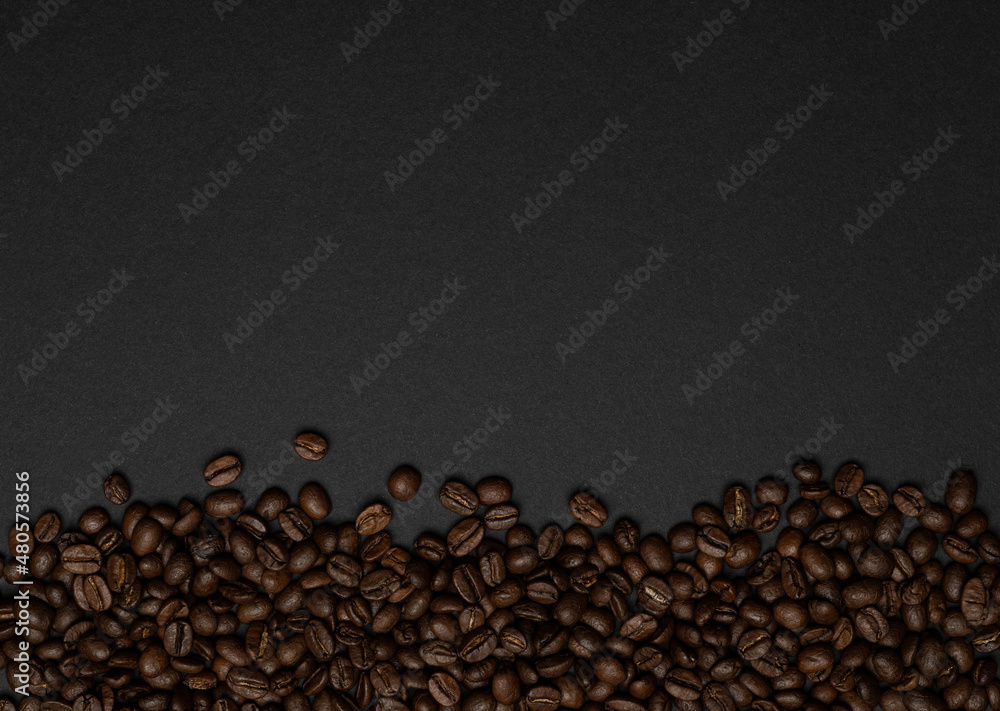 coffee beans on a black background. place for text