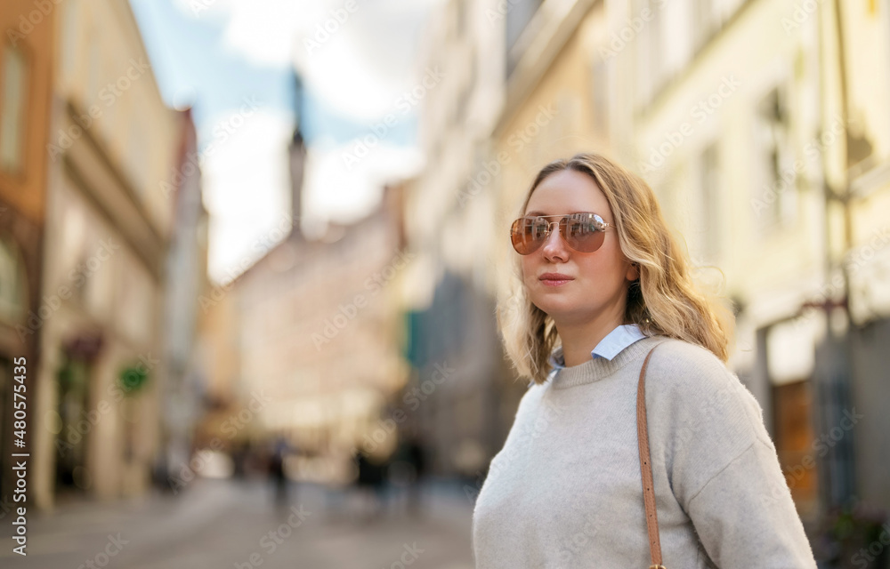 Female tourist in sunglasses in old Tallinn. Female tourist in sunglasses in old Tallinn.
