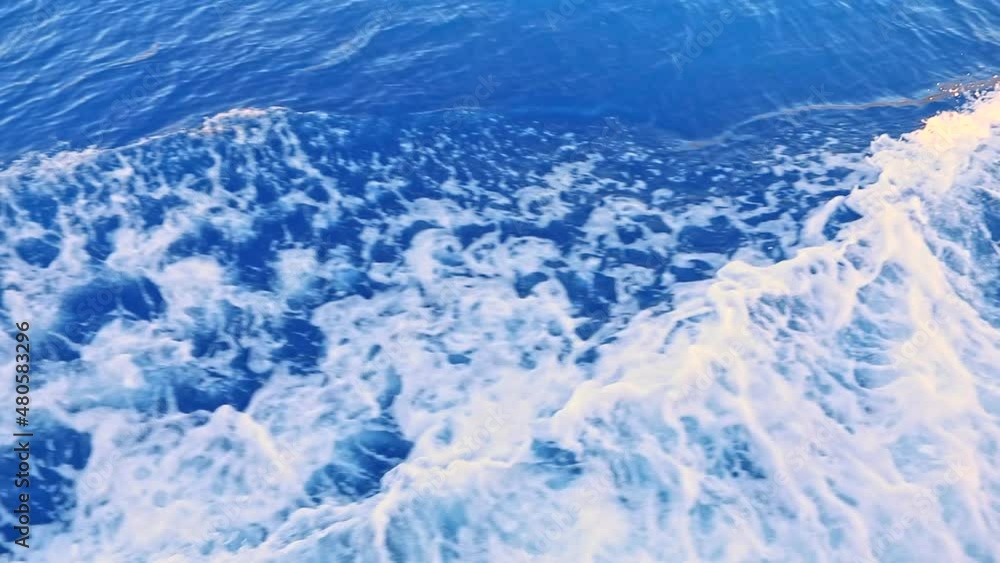 overhead view from the boat on sea waves overhead view from the boat on sea waves