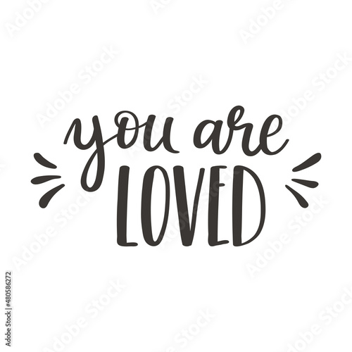 The handwritten phrase You are loved. Hand lettering. Words on the theme of Valentine's Day. Black and white vector silhouette isolated on a white background.