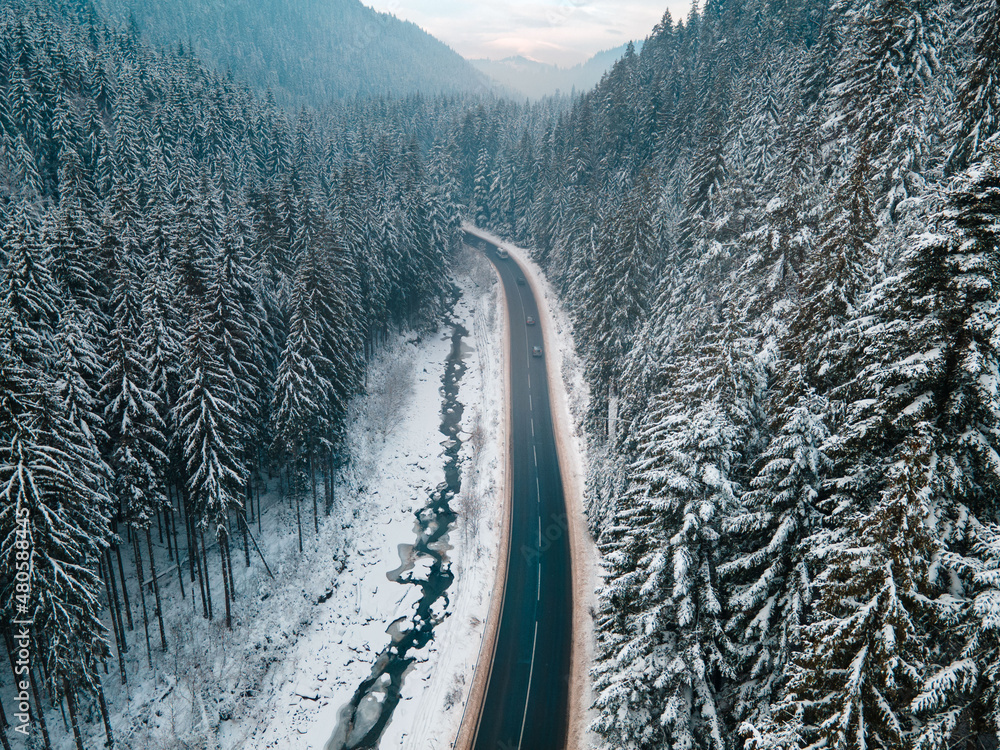 aerial view of road in winter carpathian mountains