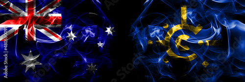 Flags of Australia, Australian vs CEFTA. Smoke flag placed side by side on black background photo