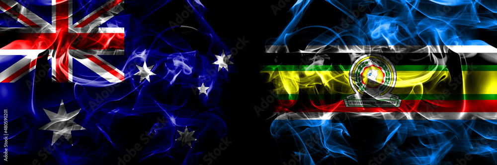 Flags of Australia, Australian vs East African Community. Smoke flag placed side by side on black background