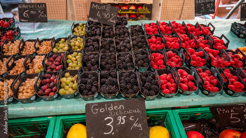 Berries counter at a market in Cannes, France photo