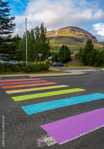 Rainbow marked crosswalk supporting equal rights for LGBT people community. Reydarfjordur - Eastfjords (Austfirðir), Iceland