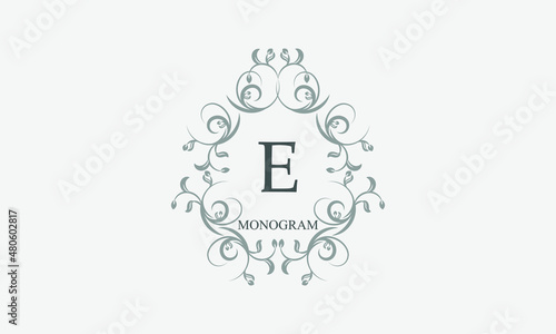Decorative monogram with the initials E. Logo template with exquisite elements and floral ornaments for restaurants, clubs, boutiques, cafes, hotel cards. Business style and brand of the company.