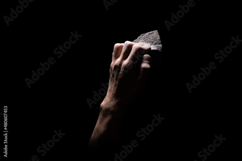 Fotografie Climbing grip half crimp on black background