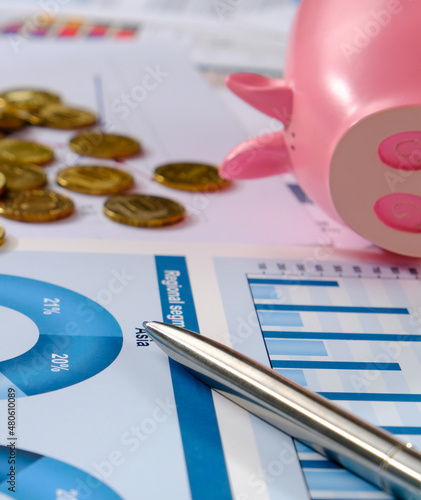 Money and business graphics on the desktop.


