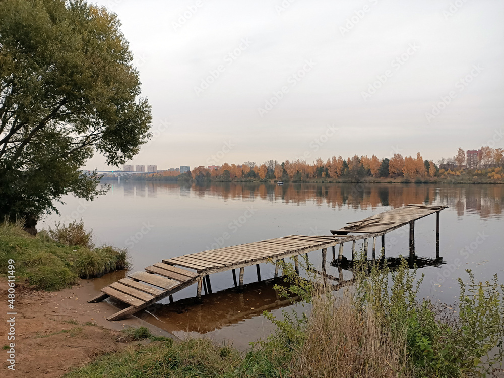 Pier on the autumn river