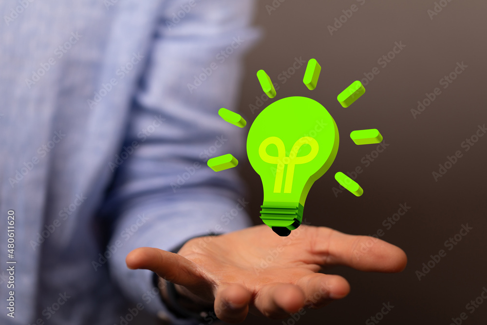 hand holding eco light bulb energy concept hand holding eco light bulb energy concept