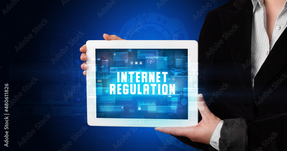 Person holding tablet, security concept Person holding tablet, security concept