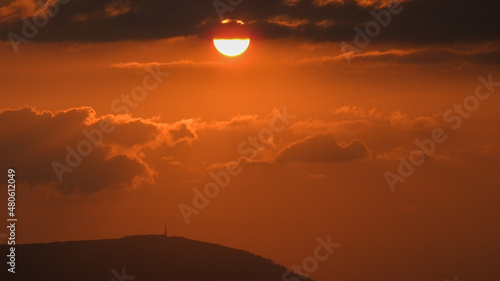 Sunset in mountains photo