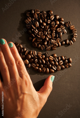 Coffee beans in a a shape of cup of coffee