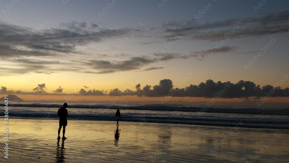 sunset on the beach,  nostalgia, two persons