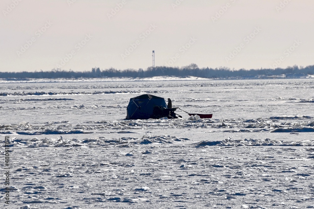 Naklejka premium Winter in Manitoba - ice fishing on Lake Winnipeg