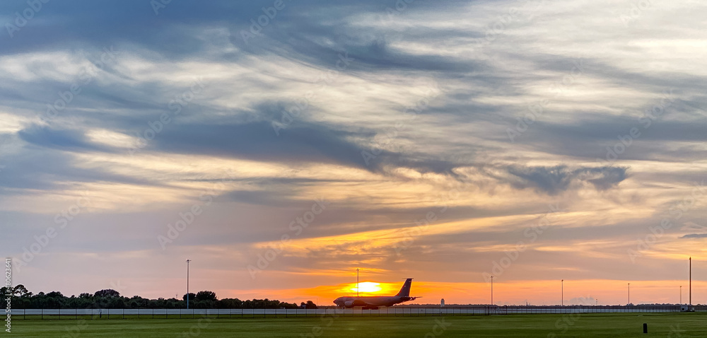 Plane in the sunrise