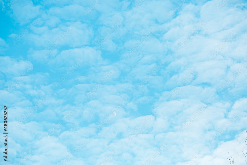 Heaven magic sky and Fluffy clouds and morning moon. Blue sky and white clouds. Beautiful sunset sky. Nature sky backgrounds. Heaven magic sky and Fluffy clouds and morning moon. Blue sky and white clouds. Beautiful sunset sky. Nature sky backgrounds.