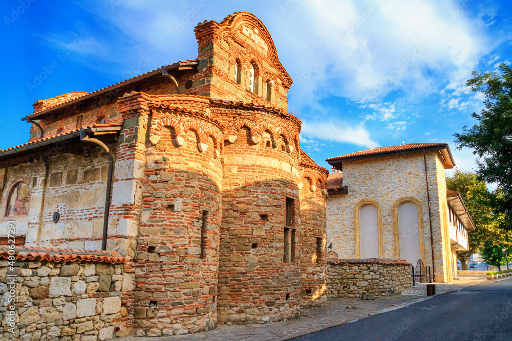 Cityscape with historic buildings - view of the Church of St. Stephen in the Old Town of Nessebar, on the Black Sea coast of Bulgaria