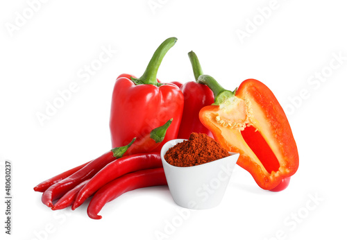 Fotografie, Obraz Fresh chili with bell peppers and bowl of paprika powder on white background