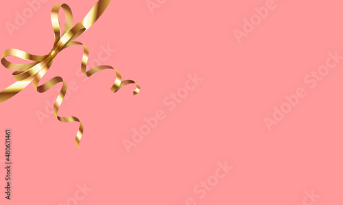 Golden bow with curly ribbons on the pink background for celebration, special event,decoration, birthday, gift box, card design, pink backgroundfor text, for a baby girl photo
