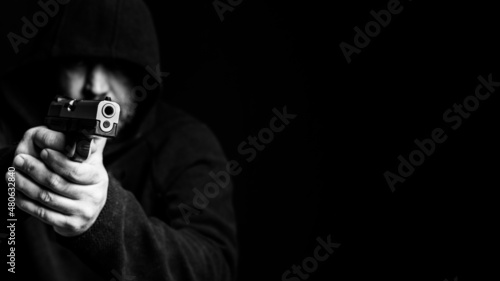 Person with gun, dark mood, black and white