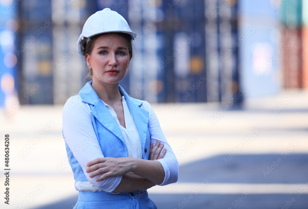 businesswoman she is working in container box yard area of logistics transportation import export or shipping industry businesswoman she is working in container box yard area of logistics transportation import export or shipping industry